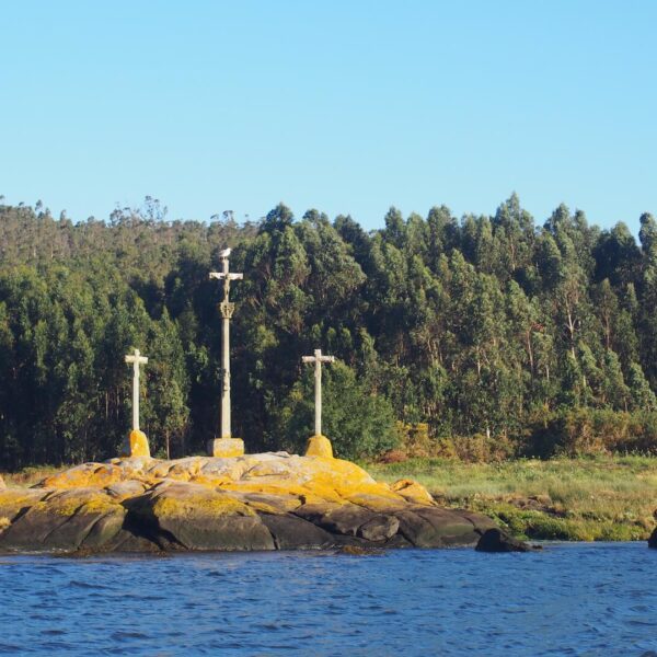 three crosses floating on the sea